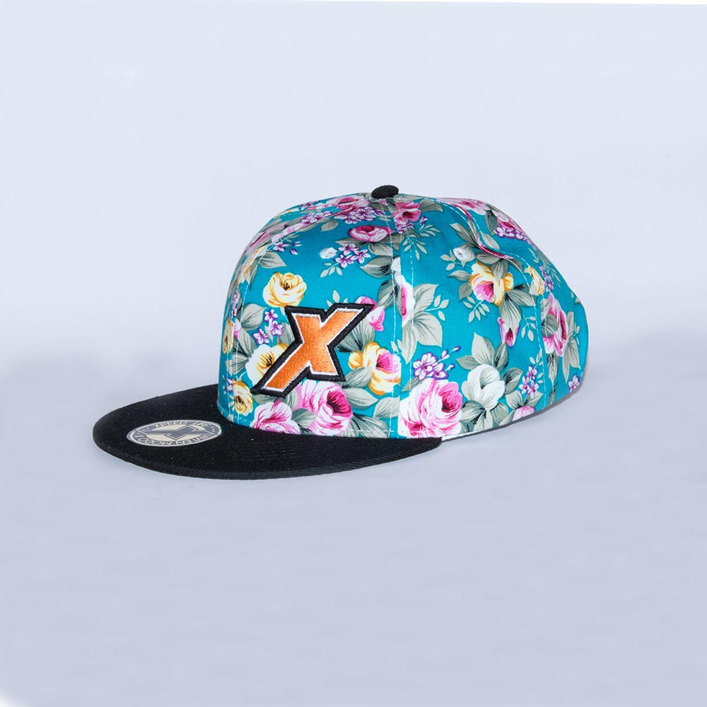 Xpeed gorra plana floreada turquesa vicera negra snap cap
